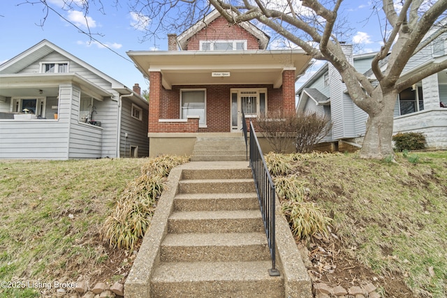 1615 Stevens Ave, Louisville, KY 40205 - view of front of home with a porch and brick siding