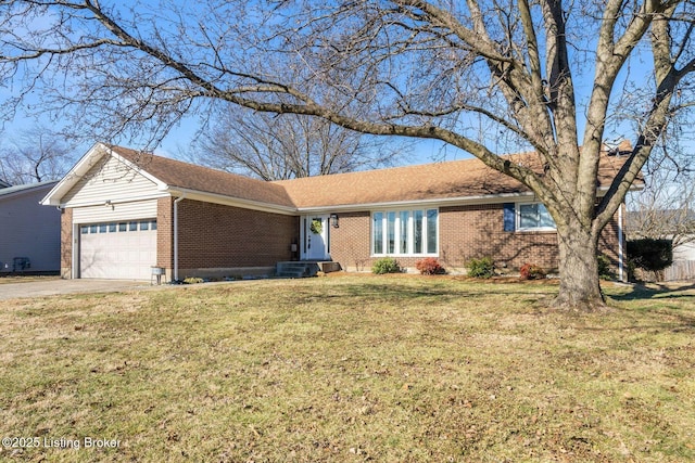 ranch-style house with a garage and a front lawn