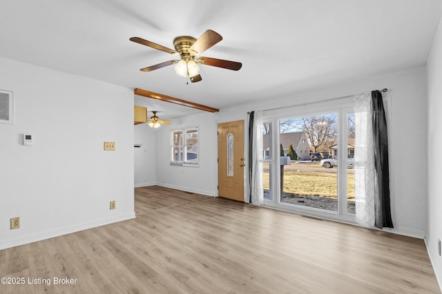 unfurnished room with light wood-type flooring