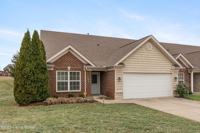 view of front of property featuring a garage and a front lawn