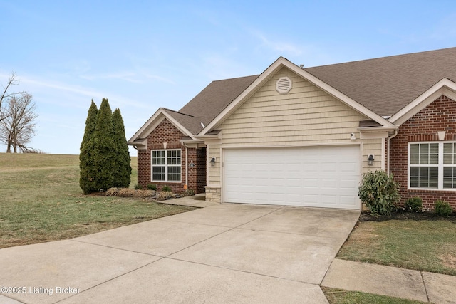 view of front facade featuring a garage and a front lawn