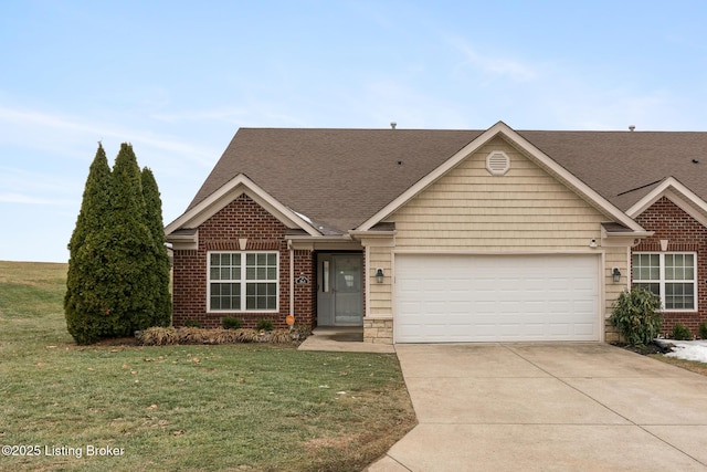 view of front facade featuring a garage and a front yard