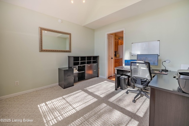 office space featuring lofted ceiling