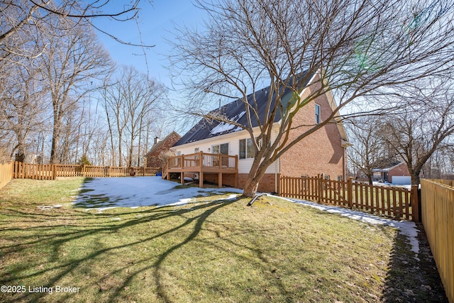 view of yard featuring a wooden deck