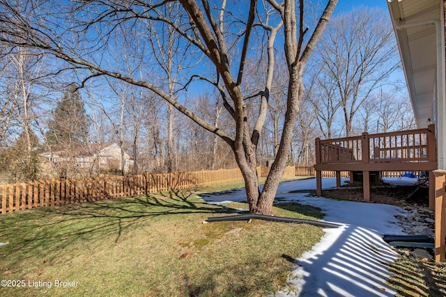 view of yard with a wooden deck