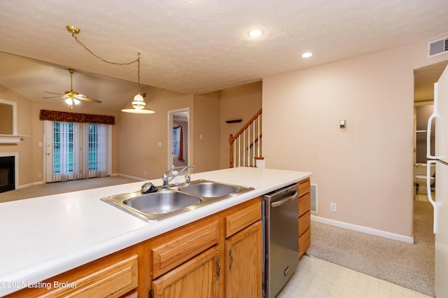 kitchen with sink, dishwasher, a textured ceiling, decorative light fixtures, and vaulted ceiling