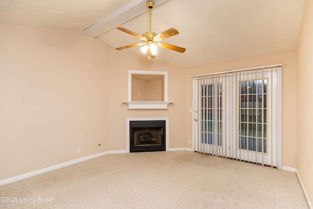 unfurnished living room with lofted ceiling with beams, carpet, and ceiling fan