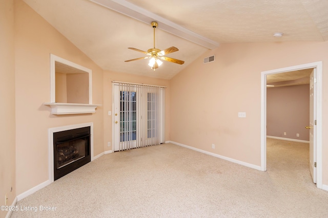 unfurnished living room with ceiling fan, light colored carpet, and lofted ceiling with beams