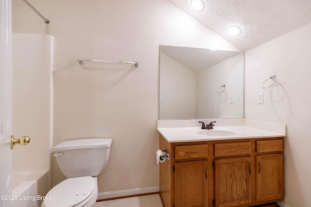 full bathroom with shower / tub combination, vaulted ceiling, vanity, toilet, and a textured ceiling