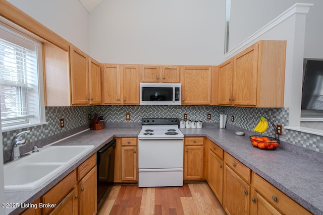 kitchen featuring sink, white electric range, high vaulted ceiling, and black dishwasher