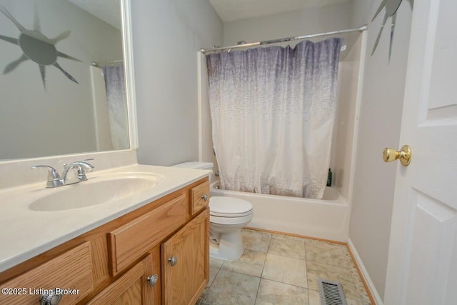 full bathroom with vanity, shower / bath combination with curtain, tile patterned floors, and toilet