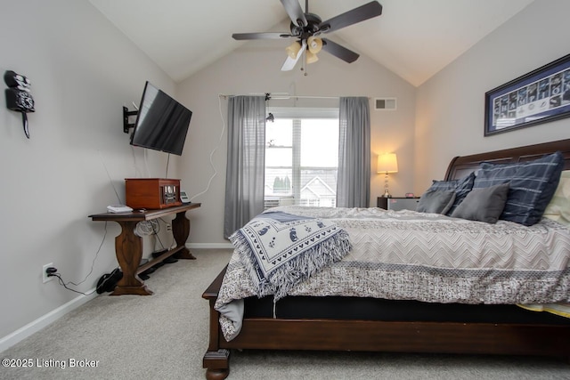 bedroom with vaulted ceiling, carpet floors, and ceiling fan