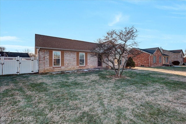 ranch-style house with a front yard