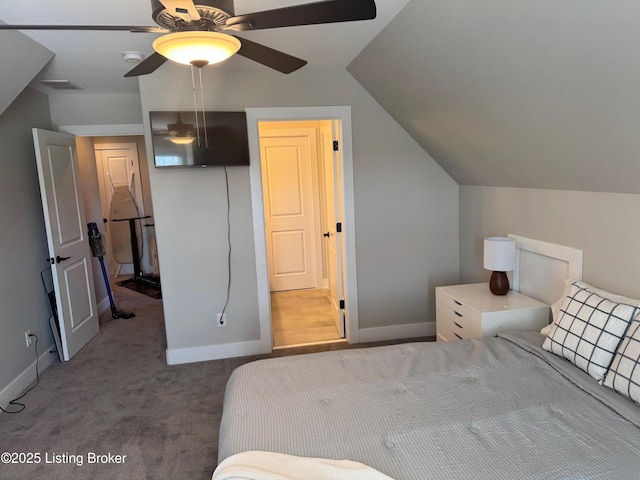 bedroom with vaulted ceiling, carpet, visible vents, and baseboards