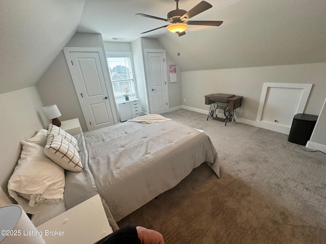 bedroom with lofted ceiling, baseboards, a ceiling fan, and light colored carpet