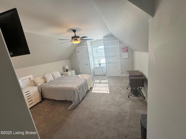 bedroom featuring lofted ceiling, carpet flooring, and ceiling fan