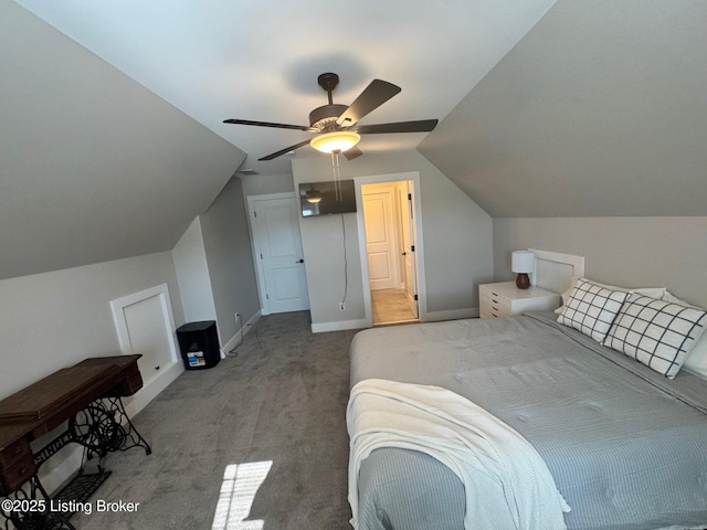 bedroom featuring ceiling fan, baseboards, vaulted ceiling, and light colored carpet