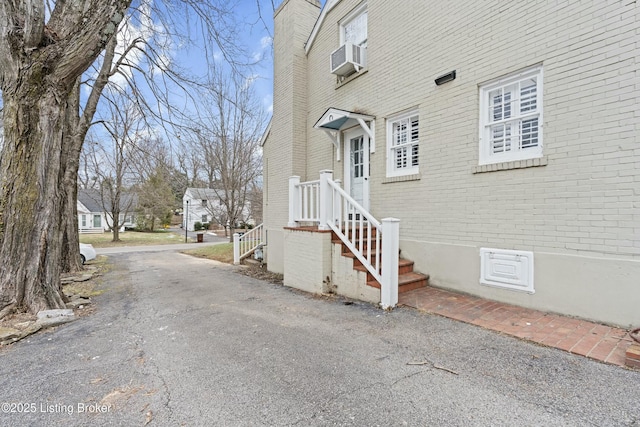 view of property exterior with cooling unit