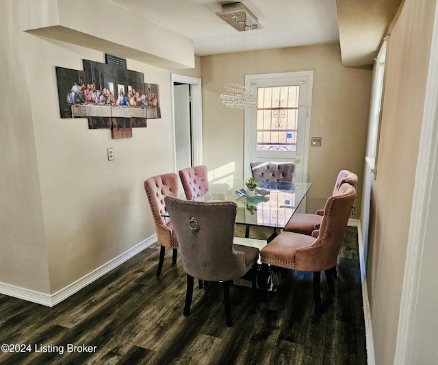 dining space with dark wood-type flooring