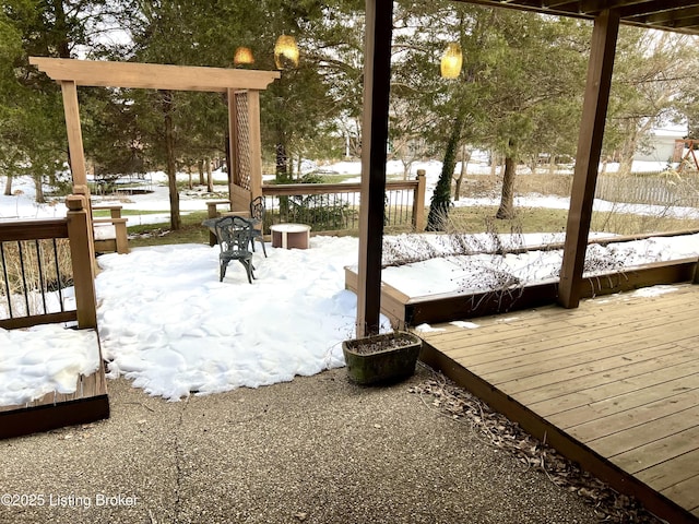 view of snow covered deck