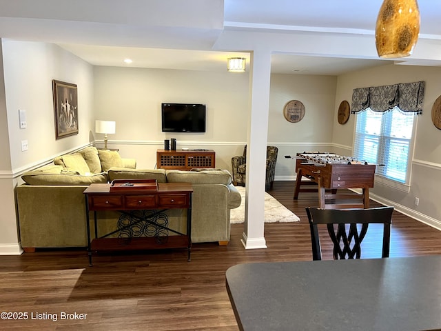 living room featuring dark hardwood / wood-style flooring