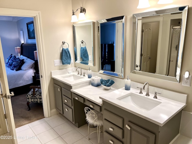 bathroom with vanity and tile patterned floors