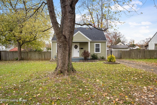 view of front of home with a front yard