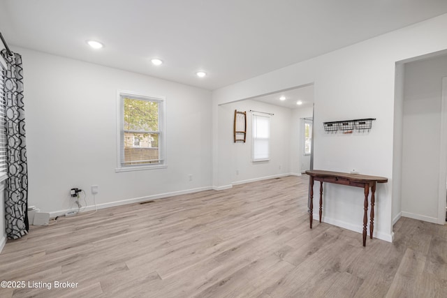 interior space featuring light hardwood / wood-style flooring and plenty of natural light