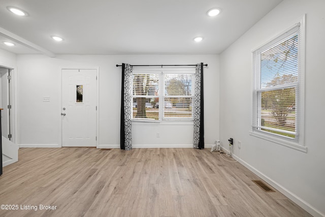 foyer featuring light hardwood / wood-style flooring