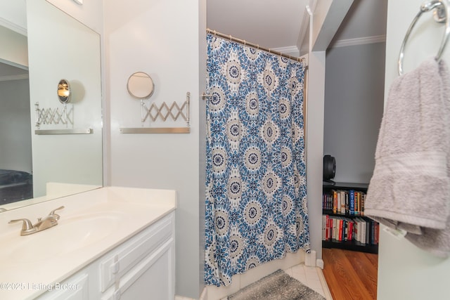 bathroom with crown molding, tile patterned floors, vanity, and a shower with shower curtain