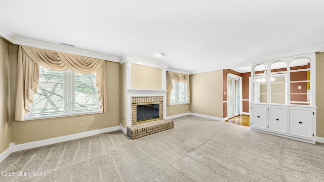 unfurnished living room with crown molding, light colored carpet, and a fireplace