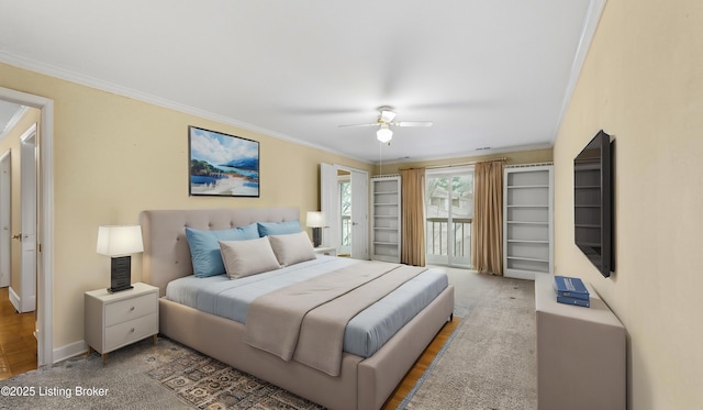 bedroom featuring crown molding, carpet, access to outside, and ceiling fan