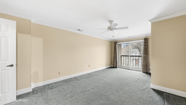 spare room with crown molding, carpet, and ceiling fan