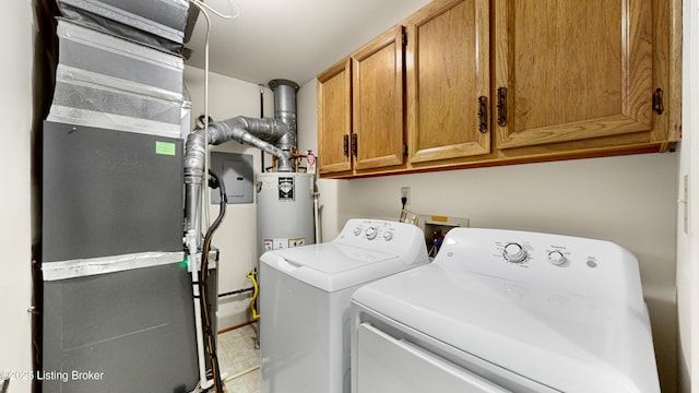 clothes washing area with separate washer and dryer, gas water heater, heating unit, and cabinets