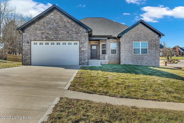 view of front facade featuring a garage and a front yard