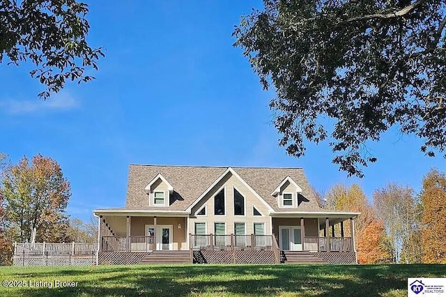 view of front of house with a porch and a front yard