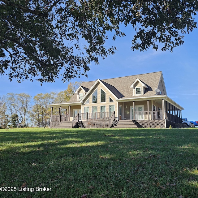 back of property featuring a yard and covered porch