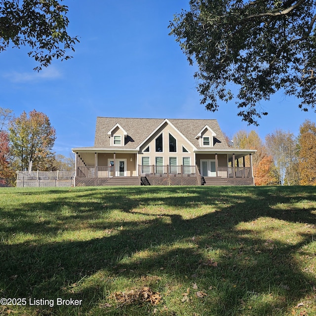 view of front of home with a front yard and covered porch