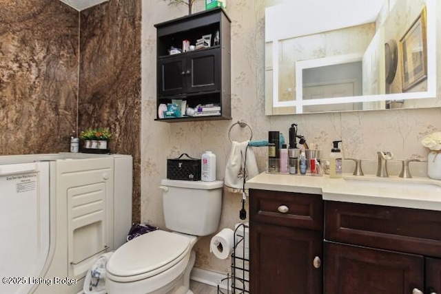 bathroom with vanity and toilet