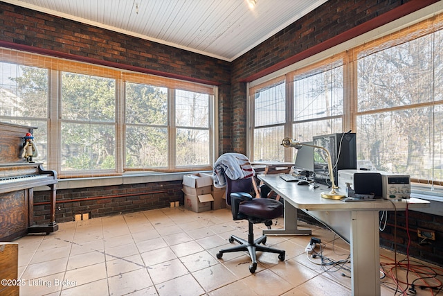 tiled office space with brick wall