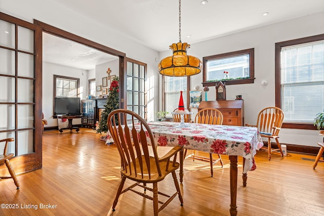 dining room featuring light hardwood / wood-style floors