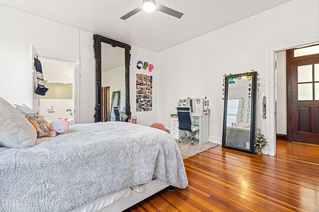 bedroom featuring wood-type flooring and ceiling fan