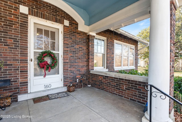 doorway to property with a porch