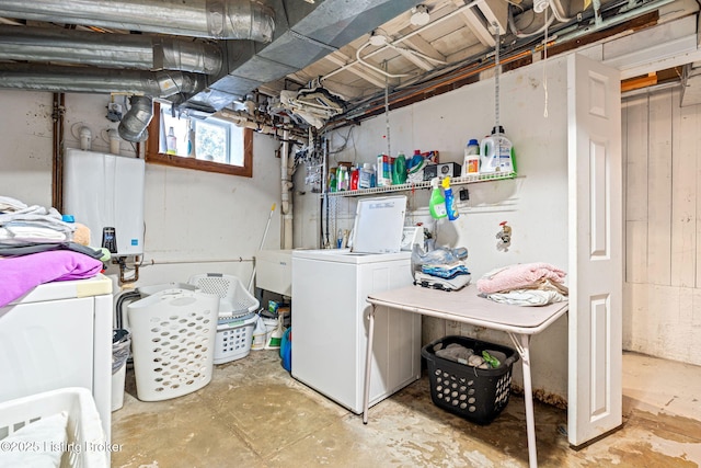 washroom featuring washer and clothes dryer