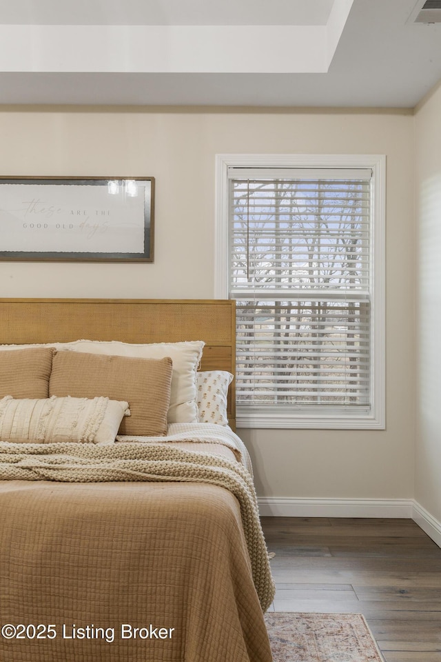 bedroom featuring hardwood / wood-style flooring