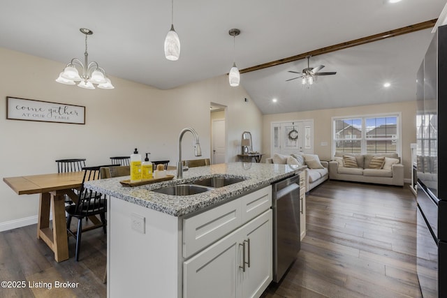 kitchen featuring sink, light stone counters, stainless steel dishwasher, a kitchen island with sink, and white cabinets