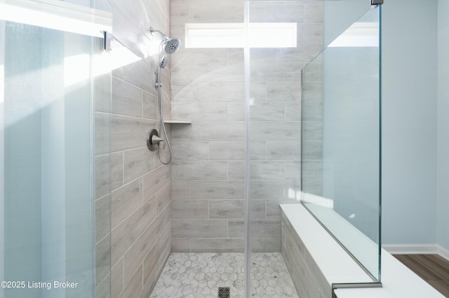 bathroom with a stall shower