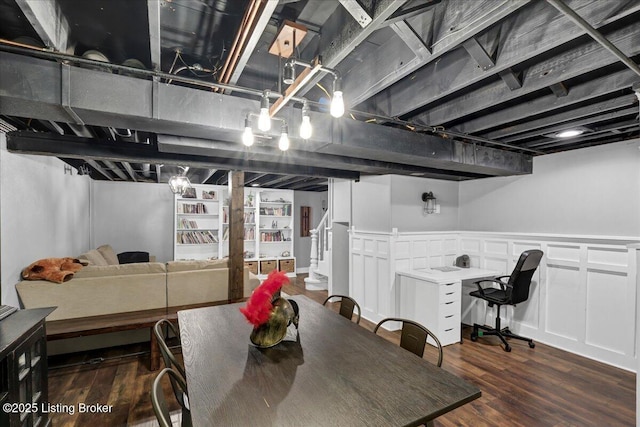 dining area featuring dark wood-type flooring