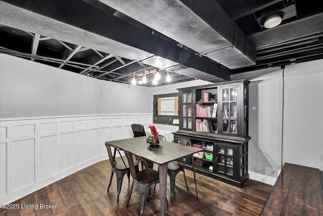 dining room with dark hardwood / wood-style flooring