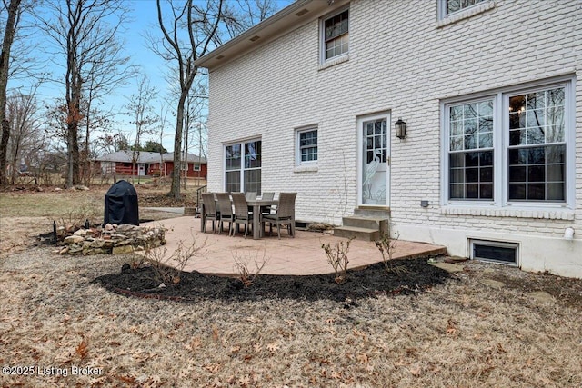 back of house with a patio